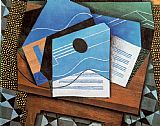 Guitar on a Table by Juan Gris